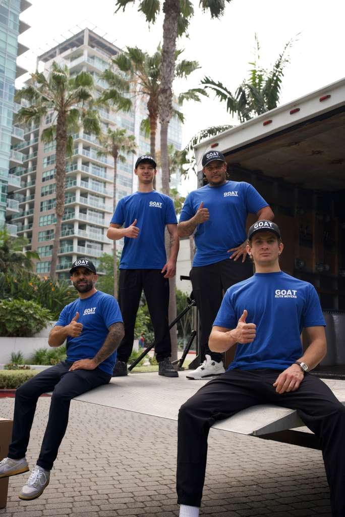 GOAT crew chilling on the truck ramp